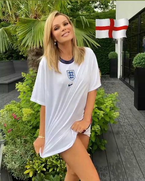 Amanda Holden stuns football fans in nothing but an England shirt | HELLO! England Football Shirt, England Shirt, Amanda Holden, England Football, Green Mini Dress, Football Tees, Rita Ora, Spice Girls, Corset Style