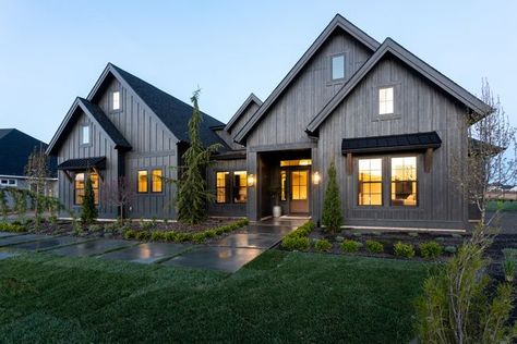 Black Modern Farmhouse with Black & White Interiors Schumaker Homes, Iron Ore Exterior House, Iron Ore Exterior, Louisiana Cottage, Barndo Exterior, Black Modern Farmhouse, Black Farmhouse, White Interiors, Black And White Interior