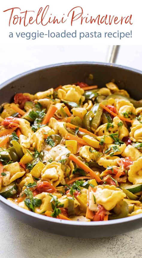 This pasta dish is loaded with fresh vegetables along with cheese tortellini and a light sauce. Tortellini Primavera is a delicious way to use you all the summer produce! Veggie Cheese Tortellini, Asparagus Tortellini Recipes, Summer Tortellini Dinner Recipes, Tortellini Vegetarian Recipes, Tortellini And Vegetables, Tortellini And Asparagus Recipes, Tortellini Asparagus Recipes, Tortellini Recipes Vegan, Vegan Tortellini Recipes