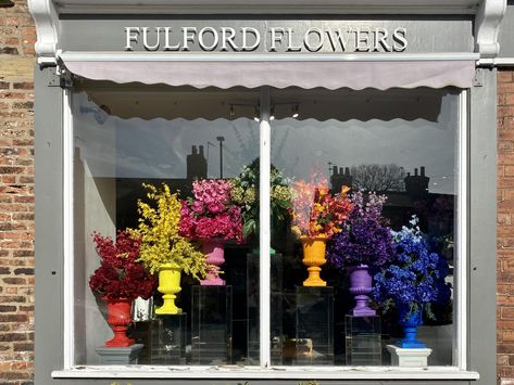 https://www.yorkpress.co.uk/resources/images/11288751/ Shop Window Flower Display, Spring Flower Shop Window Display, Mothers Day Window Display Shops, Pride Window Display, Florist Window Display, Mother’s Day Retail Window Display, Storefront Flower Installation, Flower Shop Decor, Summer Window