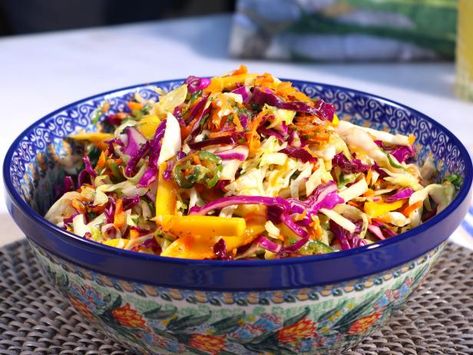 Mango Slaw Recipes, Best Coleslaw Recipe, Coleslaw Recipes, Ramen Noodle Salad, Mango Slaw, Michael Symon, Asian Slaw, Ginger Dressing, Vegetarian Cabbage