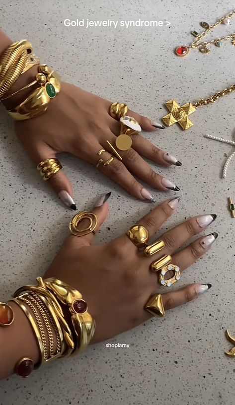 Gold Hand Jewelry Aesthetic, Ring Stack Black Woman, Gold Jewlerie Aesthetic, Rings Layout, Mixed Metal Jewelry Stack, Gold Ring Stacking Ideas, Layered Jewelry Aesthetic, Chunky Gold Jewelry Aesthetic, Engagement Rings Black Women Hand