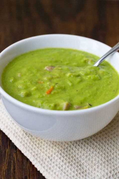 A Pea Soup that uses frozen green peas instead of split peas so that it’s ready before you believe possible. And it’s beyond delicious too. This is a quick soup recipe that's tasty for summer. Pea Soup With Ham, Green Pea Soup, Soup With Ham, Pea And Ham Soup, Mushy Peas, Split Peas, Canned Ham, Ham Soup, Freeze Greens