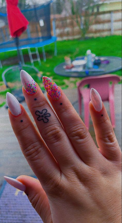 Tiny Spongebob Tattoo, Dot Finger Tattoo Meaning, Spongebob Tattoo Black And White, Cartoon Finger Tattoo, Spongebob Cloud Tattoo, Spongebob Clouds Tattoo, Spongebob Stick And Poke, Sponge Bob Flower Tattoo, Patchwork Matching Tattoos