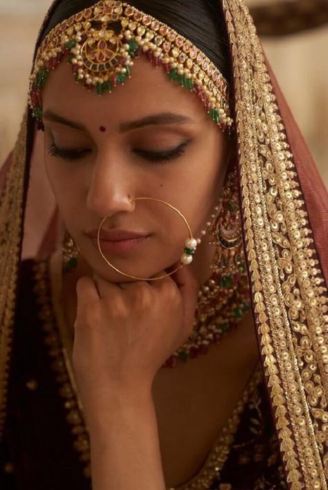 #15 Bridal Nose Rings That’ll Fit The Romantic Vibe Of 2020 Rambagh Palace, Nath Bridal, Small Nose Studs, Nose Ring Designs, Nath Nose Ring, Coloured Gemstones, Sabyasachi Jewelry, Bridal Nose Ring, Nose Ring Jewelry