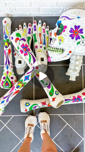 Mysha Bolen| DIY Interior Designer on Instagram: "I hand painted our 10ft tall Skeleton. We named him Coco cause well you know The Day Of The Dead (also my 3 year old daughter’s favorite movie). She thinks all skeletons are just called Coco 💀🤣.  Btw if you don’t know anything about this holiday it’s actually very beautiful and happens after Halloween! It’s like a big old family reunion -except dead ancestors are the guests of honor!  Tutorial:  Draw everything first in sharpie! The bigger the images the better!  Paint with outdoor rated craft paint. Second coat with black light paint! I learned that. Backlight paint doesn’t really show up very well in the daylight and I wanted our man Coco to look LEGIT day or night!   Note: people black light paint doesn’t work that well so avoid using Day Of The Dead Decor, Diy Day Of The Dead, Painted Skeleton, Day Of The Dead Diy, Day Of The Dead Skeleton, Holiday Decor Halloween, The Day Of The Dead, Kids Crafting, Craft Paint