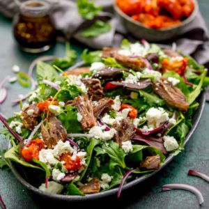 I go back to this Crispy Lamb Salad again and again. My absolute favourite salad of all time and hands down the best way to use up those roast dinner leftovers! Gluten free, super fast to throw together, and filling enough for dinner! #lambsalad #leftovers #roastdinnerlefovers #roastlamb #feta #tomatoes Lemon Roasted Potatoes, Lamb Salad, Bbq Lamb, Leftover Lamb, Chicken Quinoa Salad, Greek Potatoes, Dinner Leftovers, Steak Salad, Yummy Salad Recipes