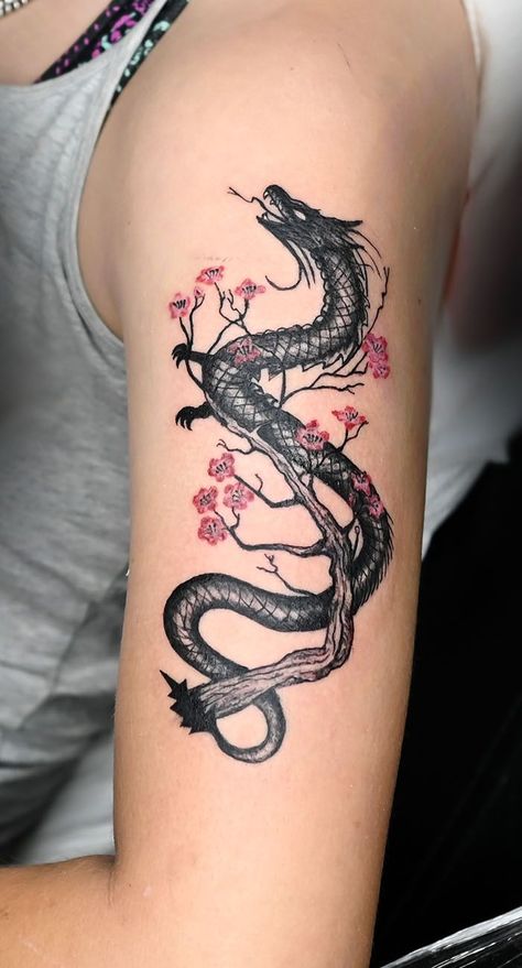 #girltattoos #ink #tattoos #dragontattoo #tattooart #inkedgirl #tattooedgirl #inked #tattoodesign Cherry Blossom Tattoo Shoulder, Dragon Tattoo Forearm, Dragon Tattoo Shoulder, Female Tattoo Artist, Atla Tattoo, Celtic Dragon Tattoos, Shop Tattoo, Small Shoulder Tattoos, Tattoo Watercolor