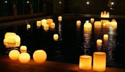 Floating Candles In Pool, Candles In Pool, Floating Pool Candles, Backyard Lighting Diy, Pool Candles, Floating Candle Centerpieces Wedding, Night Pool Party, Unity Candle Holder, Floating Candles Wedding