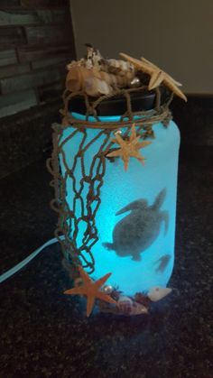 Deep Blue Sea Turtle in a Jar Ocean Themed Lanterns, How To Make Fairy Light Jars, Sea Turtle Room Ideas, Sea Turtles Craft, Diy Sea Turtle Decor, Diy Sea Turtle Crafts, Diy Turtle Decor, Bathroom Ideas Ocean Theme, Fairy Jar Ideas