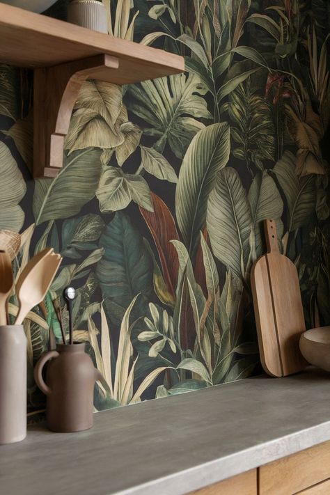 Jungle kitchen wallpaper featuring lush green leaves and plants adds a tropical, nature-inspired feel to the space. Kitchens With Wallpaper, Jungle Kitchen, Kitchen Wallpaper Design, Kitchen Wallpaper Ideas, With Wallpaper, Kitchen Wallpaper, Wallpaper Designs, Add Personality, Save For Later