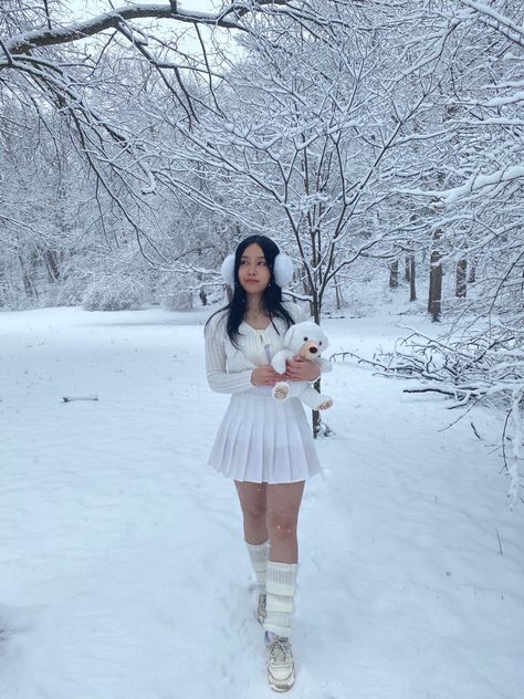 white cardigan, white leg warmers, white skirt, snow, white ear muffs, white sneakers insta: @/moondews White Aesthetic Winter Outfit, White Cardigan And Skirt Outfit, White Goth Winter Outfit, White Winter Aesthetic Outfit, White Christmas Clothes, Leg Warmers Outfit With Skirt, White Winter Skirt Outfit, White Tennis Skirt Outfit Winter, Winter White Skirt Outfit