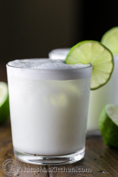 Have you tried Brazilian Lemonade? It's refreshing and smooth. You'll be surprised by the list of ingredients! | natashaskitchen.com Brazilian Limeade, Non Dairy Ice Cream, Brazilian Lemonade, Limeade Recipe, Batch Cocktails, Lemon Lemonade, Coconut Rum, Winter Drinks, Brazilian Food