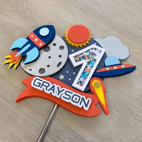 Space Cake Topper🚀 Personalized Outer Space Cake Topper, Space Theme Cake Topper, Rocket Theme Party, Astronaut Birthday, Space, two the moon cake topper, space centerpiece, Galaxy Party Decor #caketoppers #spacecaketopper #astronautparty #spaceparty #spacepartydecor #rockettopper #rocketcaketopper #galaxycaketopper #outerspace #outerspacecaketopper #outerspaceparty #caketoppers #caketoppershaker #spacebirthday #cakedecor #cupcaketoppers #minicupcake Space Theme Cake Topper, Outer Space Party Theme, Two The Moon Cake, Space Theme Party Decorations, Outer Space Cake, Astronaut Cake Topper, Space Cake Topper, Galaxy Party, Astronaut Party