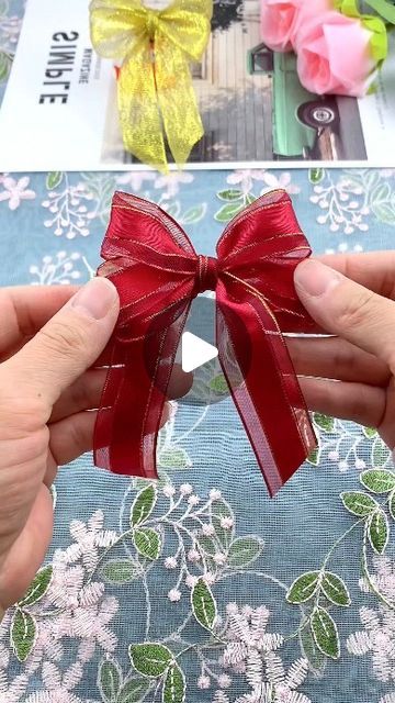 paper crafts creator on Instagram: "Title: "Simple Origami Double-Layered Bow Tie Tutorial" Hashtag: #OrigamiBowTieTutorial" How To Tie A Bow With Multiple Ribbons, How To Make Double Bow, Double Ribbon Bow Tutorial, How To Make A Double Bow, Ribbon Tie Tutorial, Tying A Bow With Ribbon, Double Bow Tutorial, Gift Bow Tutorial, Double Ribbon Bow