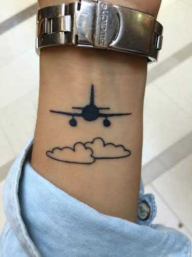 27 Wrist Tattoos For People Who LIVE To Travel | YourTango Airplane Tattoo, Plane Tattoo, Airplane Tattoos, Disney Tattoo, Small Wrist Tattoos, Cool Small Tattoos, Small Tattoos For Guys, Wrist Tattoo, Trendy Tattoos