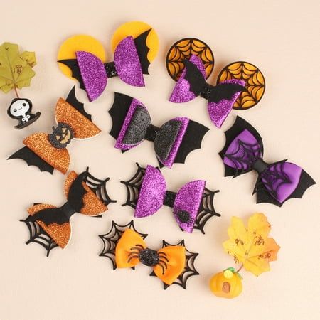 Description Decorate your kids' Halloween outfit with our Halloween hair bow clips, make your kids attractive for the Halloween party. These Halloween hair bow clips are perfect for Halloween party, with Halloween theme design, with spider, pumpkin, bat elements. Features -Color:Assorted color -Material:Artificial leather, metal, fabric -Size:10.00X5.00X1.00cm/3.93X1.97X0.39in -Provide you enough quantity and rich styles for kids dressing up needs, or you can share the Halloween bow clips with y