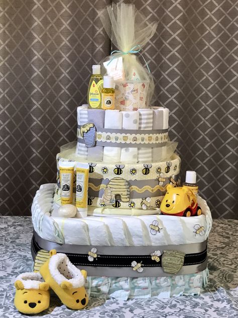 Winnie the Pooh diaper cake. Winnie the Pooh Baby Shower Winnie The Pooh Basket Ideas, Winnie The Pooh Baby Shower Gifts, Pooh Bear Diaper Cake, Winnie The Pooh Baby Shower Gift Ideas, Winnie The Pooh Diaper Cake Ideas, Whinney Pooh Baby Shower Ideas, Winnie The Pooh Baby Shower Decorations, Winnie The Pooh Baby Shower Ideas Boy, Winnie The Pooh Baby Shower Cake