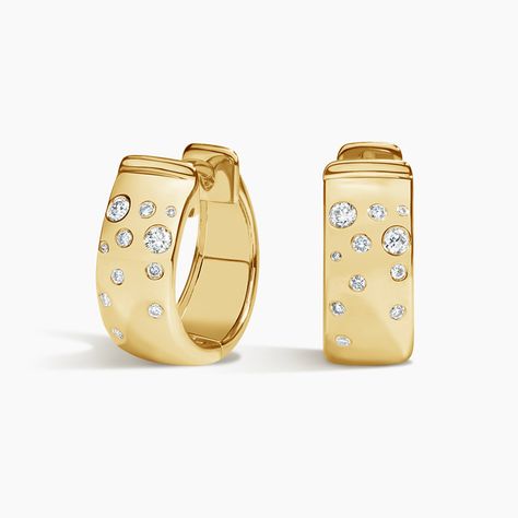 Cascade Diamond Huggie Ears - 14K Yellow Gold. An updated take on a classic look, these wide huggie hoop earrings sparkle with cascading flush set round diamonds that are perfect for chic, everyday wear (1/6 total carat weight). Yellow Gold Huggie Earrings, Ear Jewellery, Diamond Huggie Earrings, Diamond Huggies, Ear Party, Diamond Jewelry Necklace, Sparkle Earrings, Classy Jewelry, Gold Diamond Earrings