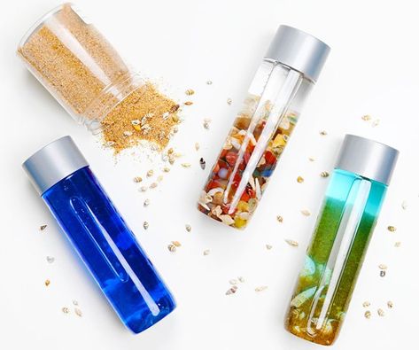 Moon Sand Recipe | How to Make Moon Sand Sensory Bottles Diy, Rainbow Sensory Bottles, Voss Water Bottle, Ocean In A Bottle, Glitter Sensory Bottles, Galaxy In A Bottle, Ocean Sensory, Types Of Cooking Oil, Calm Down Jar