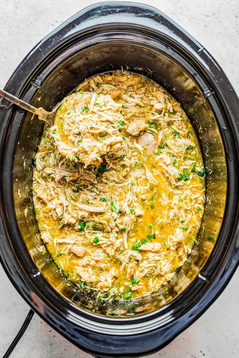 Slow Cooker Green Chile Chicken - Tender, juicy, chicken that's simmered with green chiles, jalapeno, salsa verde, onions, garlic, and spices for the most FLAVORFUL and versatile green chile chicken! Use it in tacos, burritos, casseroles, sandwiches, or as a meal prep recipe. Best of all, it's SO EASY because your slow cooker does ALL the work! Salsa Verde Chicken Crockpot, Paleo Chicken Chili, Salsa Chicken Crockpot, Homemade Salsa Verde, Verde Chicken, Green Chile Chicken, Salsa Verde Chicken, Averie Cooks, Tacos Burritos