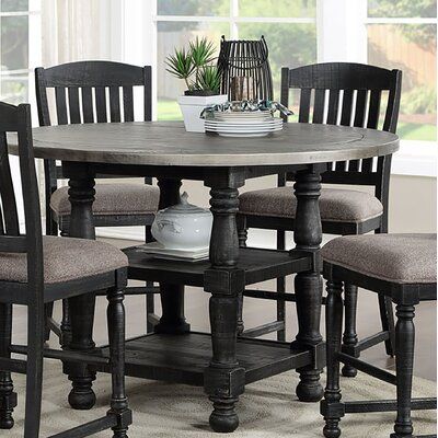 Gather around this new dining set! Your choice of rectangular dining table or a more casual round gathering table. This is made of solid pine along with your choice of two finishes options. You have the option of a two-tone distressed grey over a weather distressed black, or a two-tone antique grey over a distressed french grey finish. These colours will accent your dining decor! The dining table has a plank top and large turned style legs. The round gathering table has large turned legs with ex Black And Gray Dining Table, Gray Table With Black Chairs, Weathered Gray Dining Table, Dark Gray Dining Table, Gray Dining Chairs With Wood Table, Grey And Black Dining Table, Black And Grey Dining Table, Grey Stained Table, Old Dining Table Makeover