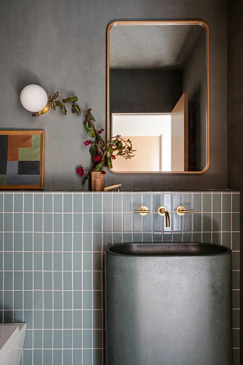 Tour Brian and Jessie De Lowe’s Montecito Ranch Home | domino Small Powder Toilet Design, Powder Toilet Design Modern, Powder Room Mid Century Modern, Fireclay Tile Bathroom, Terracotta Powder Room, Earthen Interiors, Modern Small Powder Room, Powder Room Tiles, Tiled Powder Room