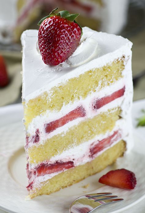 Strawberry Shortcake - layers of dense, buttery and moist vanilla cake filled with fresh whipped cream and fresh sliced strawberries. Easy spring ( or summer ) dessert recipe to celebrate the arrival of my favorite season. Cake For Strawberry Shortcake, Strawberry Cake Filling, Easy Strawberry Shortcake, Shortcake Cake, Moist Vanilla Cake, Strawberry Shortcake Cake, Strawberry Shortcake Recipes, Shortcake Recipe, Strawberry Cake Recipes