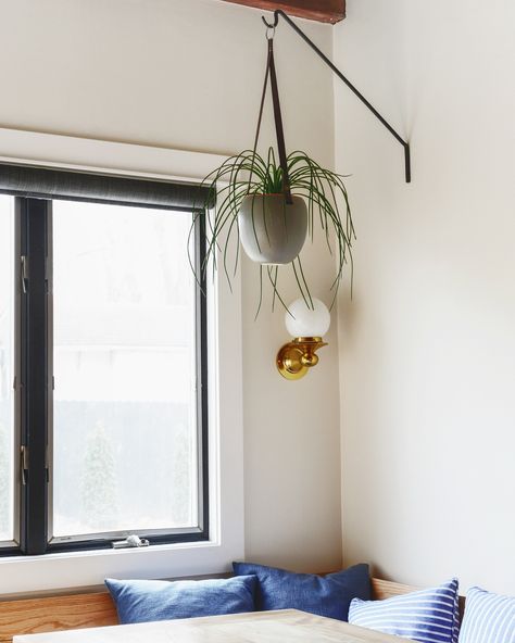 A corner dining nook with oak wood and navy throw pillows | via Yellow Brick Home Hanging Plant Hooks, Fake Potted Plants, Wall Hanging Decorations, Plant Bracket, Yellow Brick Home, Indoor Plant Wall, Wall Plant Hanger, Artificial Hanging Plants, Wooden Wall Hooks