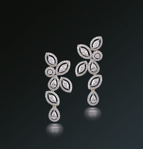 “Falling Rain-drops” Capturing the beauty of falling raindrops with marquise, pear and round diamonds totaling 5,50 carats set in 18 karat white gold, the artist creates a “mystery” for the onlooker… ...which one will drop first..? Diamond Jewelry Earrings, White Diamond Earrings, Diamond Earrings Design, Long Earring, Diamond Jewellery, Rain Drops, Jewelry Designs, Long Earrings, Designer Earrings