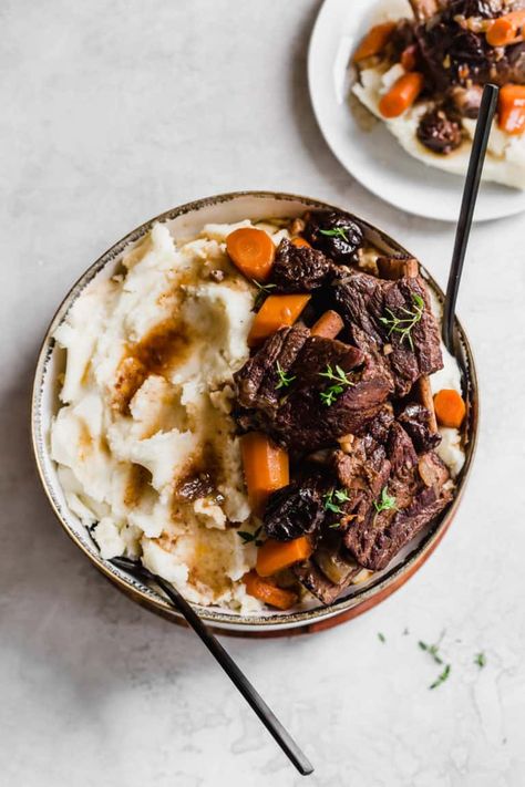 Tender, fall apart drunken beef short ribs, with rye, carrots, and prunes is a GAME CHANGER. #beef #shortribs #ribs #beefribs #rye #carrots #prunes #dinner #dinnerparty #braised #braisedmeat #holiday #thanksgiving #christmas #hanukkah #photography #foodphotography #styling #foodstyling #dinnermadeeasy #easyentertaining #ribphotography #shortribphotography #beefphotography #potroast #potroastphorography #lowandslow Dinner Party Dishes, Paula Hawkins, Perfect Dinner Party, Braised Short Ribs, Cozy Meals, Braised Beef, Beef Short Ribs, Winter Comfort, Tender Beef