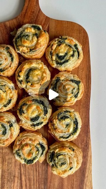 Annie | Home Cook Recipes | Aussie Mum on Instagram: "SPINACH & FETA SWIRLS 🤩 ⬇️

🧀 A deliciously easy and cheesy freezer-friendly snack, perfect for lunchboxes!

INGREDIENTS 
- 250 grams frozen spinach, thawed and squeezed to remove moisture 
- 2 sheets puff pastry
- 2 cloves garlic, minced
- 100 grams feta cheese, crumbled
- 1/2 cup finely grated cheese
- 1 egg, beaten

METHOD
1. Preheat your oven to 220°C, and line two trays with baking paper.
2. Chop up the thawed spinach and pat it dry between some paper towel. 
3. Brush minced garlic over each puff pastry sheet, then sprinkle over the spinach, crumbled feta cheese, and grated cheese over the sheets, leaving a small strip on one side without filling. 
4. Starting from the opposite side of the sheet to the strip without filling, tigh Spinach And Cheese Pinwheels, Spinach Feta Rolls, Spinach Puff Pastry, Spinach Puff, Easy Puff Pastry Recipe, Puff Pastry Recipes Savory, Spinach Rolls, Cheese Puff Pastry, Easy Puff Pastry