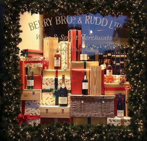 Berry Bros. & Rudd (@berrybrosrudd) • Instagram photos and videos Wine Store Display, Christmas Window Display Retail, Wine Store Design, Christmas Store Displays, Christmas Shop Displays, Wine Photo, Holiday Window Display, Window Display Retail, Storing Christmas Decorations