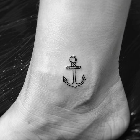 Discover the elegance of simplicity with this charming anchor tattoo, a symbol of stability and grounding. Let it inspire your next ink choice. Save & follow for more minimalist tattoo inspiration. Nestled on the inside of an ankle, its crisp lines and understated design speak volumes about finding balance in life's turbulent seas. #MinimalistTattoo #AnchorInk #InkInspiration #StayGrounded #AnkleTattoo #TattooArt #FollowForMore #SaveThis # Minimal Anchor Tattoo, Anchor Tattoo On Ankle, Fine Line Anchor Tattoo, Anchor Tattoos For Women, Tattoo On Ankle, Anchor Tattoos, Nautical Tattoo, Anchor Tattoo, Finding Balance