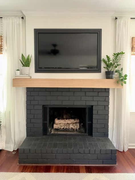 Fireplace Ideas Painted Brick, Black Fireplace Mantel Brick, Stain Brick Fireplace Black, Dark Wash Fireplace Brick, Dark Gray Painted Fireplace, Redone Brick Fireplace, Brick And Wood Fireplace Makeover, Repainting A Fireplace, Stain Fireplace Brick