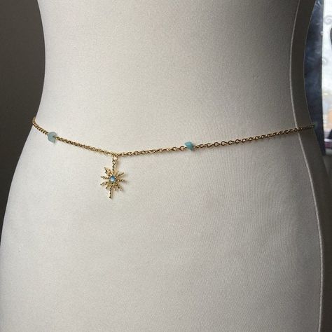 Enhance your summer style with this stunning gold waist chain featuring eye-catching blue crystals and a gold charm. This unique accessory is perfect for adding a touch of elegance and fun to any outfit. Whether you're headed to the beach or a festival, this waist chain is sure to turn heads and make a statement. Handcrafted with love, this piece is a must-have for any jewellery lover looking to elevate their look effortlessly. Each stone fragment is added by hand.  Waist chain comes in 3 sizes, Rhinestone Belly Chain, Dr Accessories, Gold Waist Chain, Youtuber Dr, Ethereal Jewelry, Blue Or Pink, Waist Beads, Belly Chain, Waist Chain