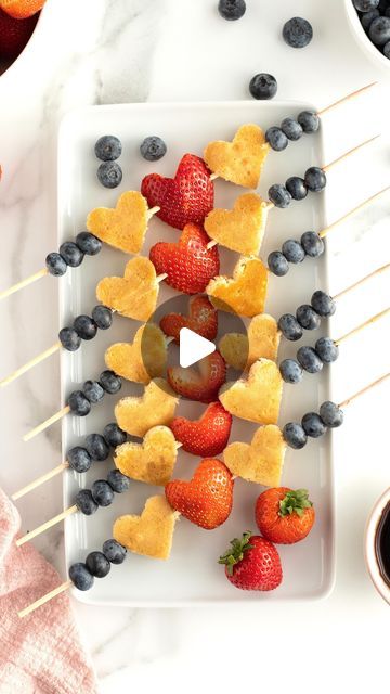 Maegan Brown ~ The BakerMama on Instagram: "Cupid’s Pancake Kabobs are an adorable idea for a special Valentine’s breakfast or party treat! 💘 Made with just three ingredients, they’re simple and so fun to serve with a side of syrup and love! 🥞🍓🫐

Comment “cupid” and I’ll DM you the how-to link! or tap the link in profile @thebakermama 🤗 #TheBakerMama

https://thebakermama.com/recipes/cupids-pancake-kabobs/

#pancakes #skewers #cupid #pancakekabob #fruitskewer #breakfast #valentinesday #valentinesdayrecipe #valentinesdaybreakfast #valentinesdayparty #breakfastideas" Pancake Skewers, Pancake Decoration Ideas, Mini Pancake Kabobs, Valentine’s Day Pancakes, Valentine’s Day Fruit Kabob, Valentine’s Day Skewers, Fruit Skewers, Three Ingredient, Valentine Special