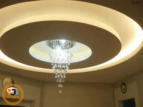 Round false ceiling Round False Ceiling, Ceiling Pop, Wallpaper Bedroom Feature Wall, Plaster Ceiling Design, Drawing Room Ceiling Design, Luxury Ceiling Design, Mirror Decor Living Room, Fall Ceiling, House Ceiling