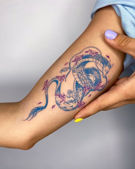 Taylan Ulukır on Instagram: “Cute blue dragon with purple flowers for Elif.. It was nice meeting you guys, thank you! 💙🐉💜🐉 . . . . #tattoodesign #snaketattoo…” Purple Dragon Tattoo For Women, Blue Ink Dragon Tattoo, Dragon Tattoo Colorful, Blue Dragon Tattoo For Women, Purple And Blue Tattoo, Blue And Red Tattoo, Colored Tattoos For Women, Red And Blue Tattoo, Dragon Art Tattoo