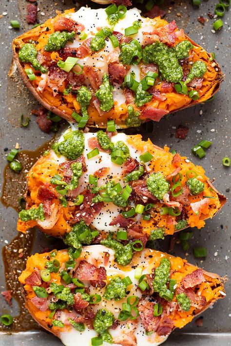 The ultimate breakfast/brunch-inspired stuffed sweet potato boat. My stuffed sweet potatoes are easy to make and deliver so much sweet and savory flavor. Tender sweet potato, runny baked egg, bacon, green onion, everything bagel seasoning, and fresh homemade basil pesto belong in the brunch hall of fame. #sweetpotatorecipes #brunchrecipes #sweetpotatoboats #stuffedsweetpotatoes Brunch Dishes Ideas, Sweet Potato Stuffed, Stuffed Potato, Sweet Potato Boats, Breakfast Sweet Potato, Sweet Potato Baked, Baked Sweet Potato Recipes, Stuffed Potatoes, Sweet Potato And Proscuitto