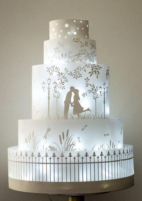 #shaadiwish #indianwedding #cake #cakeideas #cakedecorating #cakedesign #weddingcake #weddingcakes #fancycake #uniquecakedesigns #pinterest Silhouette Wedding Cake, Wedding Cake Art, Silhouette Cake, Winter Wedding Cake, Wedding Silhouette, Amazing Wedding Cakes, Cake Trends, Unique Wedding Cakes, Wedding Cake Inspiration