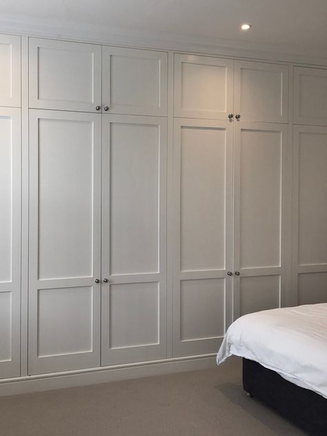 Bespoke fitted wardrobes, installed floor-to-ceiling along one wall of the master bedroom at a beautiful Victorian home in the London borough of Wandsworth. 
See more photos of our bespoke wardrobe projects, on our website. 
#FittedFurniture #London #AlcoveFurniture #InteriorDesign #Storage #Wardrobes #FittedWardrobe #BespokeFurniture #Decor #VictorianProperty #PeriodHomes #Bedroom #BedroomFurniture Built In Wardrobe Vaulted Ceiling, Victorian Fitted Wardrobe, Small Bedroom Fitted Wardrobe Ideas, Full Wall Wardrobe, Inbuilt Wardrobe, Full Wall Closet, Fitted Wardrobe Ideas, Bedroom Alcove, Floor To Ceiling Wardrobes