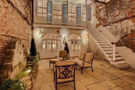 This Creole townhouse was built in 1830 and mixes French and Caribbean architectural elements. Our favorite feature? The stunning courtyard. View the listing on Zillow. French Colonial Homes, New Orleans Style Homes, French Colonial Style, New Orleans Decor, Creole Cottage, Modern Courtyard, Courtyard Design, French Style Homes, New Orleans Homes