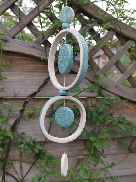 Handmade Ceramic Garden Art, Pottery Windchimes Ideas, Ceramic Series Ideas, Pottery Mobile Ideas, Ceramic Wall Hangings, Pottery Garden Ideas, Pottery Windchimes, Ceramic Wall Art Hanging, Clay Wind Chimes