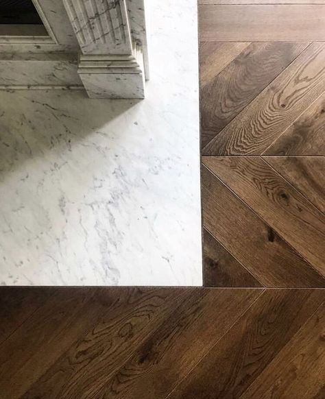 Wood And Marble Floor, Marble Wood Floor, Chevron Wood Floor, Chevron Floor Tile, Chevron Tiles Floor, Tile To Wood Transition, Chevron Flooring, Calacatta Tile, Modern Classic Living Room