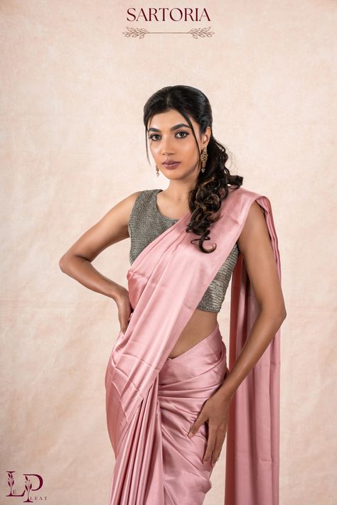 With the Pink Satin Saree, your styling possibilities are endless. Create trendy pleats, experiment with pallu drapes, or add your own twist to traditional styles. Let your saree be an expression of your unique personality! Pink Satin Saree, Blouse Styling, Satin Sarees, Dusky Skin, Saree Fancy, Glitter Blouse, Silver Blouse, Saree Draping Styles, Fancy Sarees Party Wear