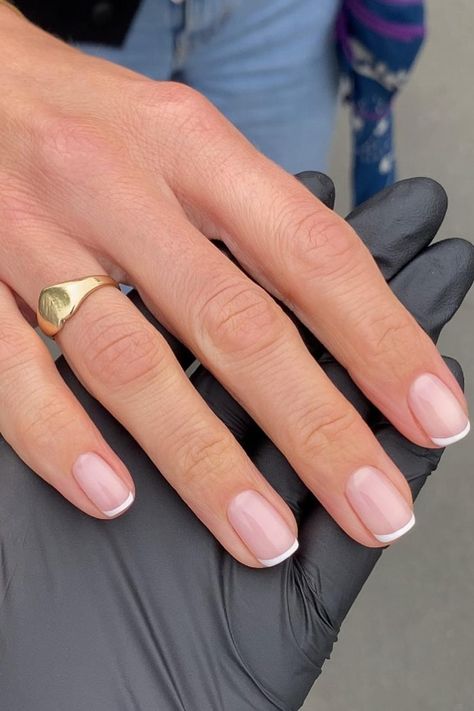 Embrace timeless elegance with a classic French manicure on short, natural square nails. The subtle pink base and crisp white tips exude sophistication and simplicity, creating a perfectly chic and polished look. // Photo Credit: Instagram @fayelouisedennis White Short Nails French Tip, This French Tip Nails, French Tip Vs American Tip Nails, Extra Short Nails French Tip, Classy Short French Nails, Elegant Nails Classy French Tips Short, French Nail Manicure, Gel French Nails Short, French For Short Nails