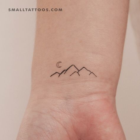 The mountains are just one of the many wonders that Mother Nature has blessed us... Above Wrist Tattoos For Women, Small Tattoo Ideas Nature, Delicate Mountain Tattoos For Women, Small Wilderness Tattoo, Small Mountain Tattoo Wrist, Simple Mountain And Tree Tattoo, Minimalist Mountain And Sea Tattoo, Small Mountain And Water Tattoo, Fineline Mountain Tattoo