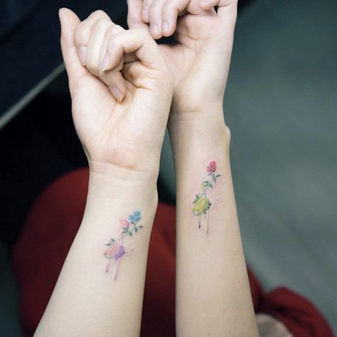 16 Best Friend Tattoos to Show Off Your Squad Love | Brit + Co Watercolor Wrist Tattoo, Floral Watercolor Tattoo, Tattoos For Best Friends, Sunflower Tattoo Shoulder, Matching Best Friend Tattoos, Watercolor Tattoo Flower, Beautiful Flower Tattoos, Halloween Tattoo, Floral Tattoo Design