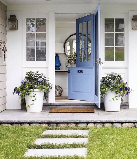 A pop of color can make a big impact! This shade of blue is a really nice choice for this beautiful dutch door, and brings a bit of wow-… Exterior Entryway Ideas, Shutters Repurposed Decor, Pintu Ganda, Blue Front Door, Farmhouse Front Door, نباتات منزلية, Dutch Door, Farmhouse Front, Front Door Colors